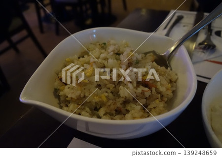 Fried Rice in White Bowl with Spoon Fried Rice in White Bowl with Spoon 139248659