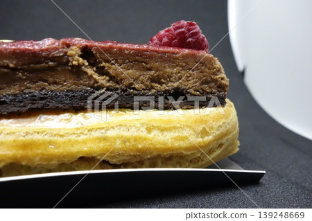 Layered Dessert with Raspberry and Chocolate Layers 139248669