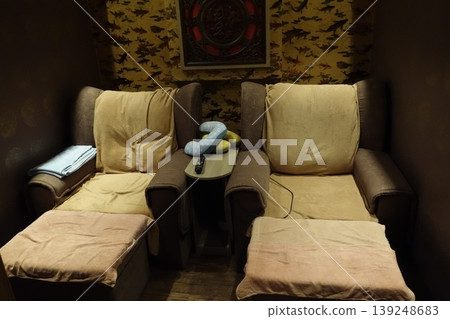 Cozy Theater Seating with Recliners and Wall Decor Cozy Theater Seating with Recliners and Wall Decor 139248683