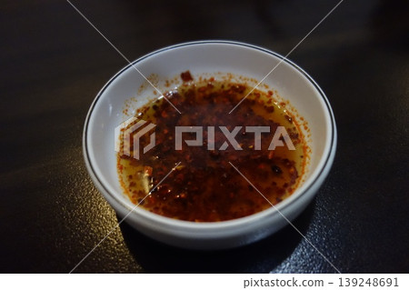 Chili Oil in White Bowl 139248691