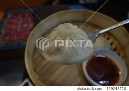 Steamed Bun on Fork with Bamboo Steamer 139248718