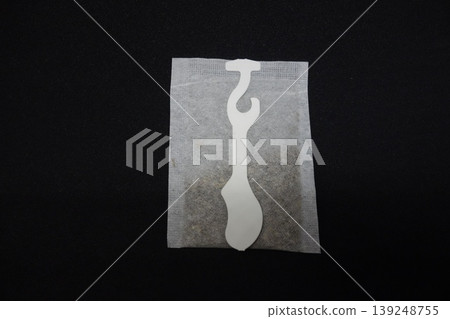 White Plastic Hook on Textured Paper Bag White Plastic Hook on Textured Paper Bag 139248755