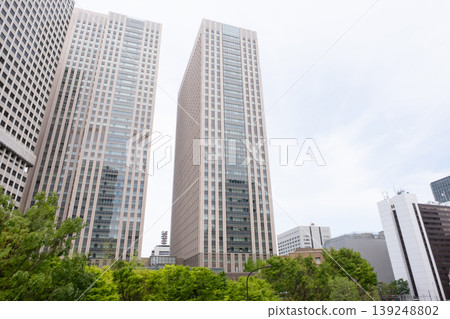 A view of the office district looking up at the skyscrapers of Toranomon. A view of the office district looking up at the skyscrapers of Toranomon. 139248802