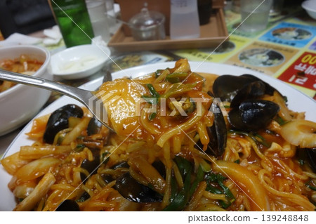 Korean Kimchi Stew with Seafood and Noodles Korean Kimchi Stew with Seafood and Noodles 139248848