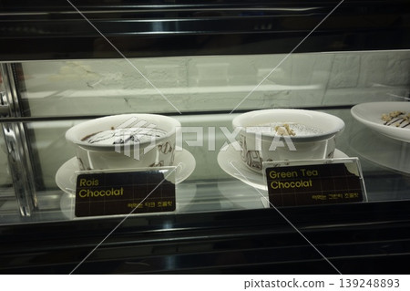 Chocolate Desserts in Glass Display Case Chocolate Desserts in Glass Display Case 139248893