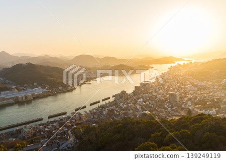 Winter in the Seto Inland Sea: Onomichi City, Hiroshima Prefecture - The town of Onomichi at dusk. Winter in the Seto Inland Sea: Onomichi City, Hiroshima Prefecture - The town of Onomichi at dusk. 139249119