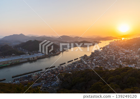 Winter in the Seto Inland Sea: Onomichi City, Hiroshima Prefecture - The town of Onomichi at dusk. Winter in the Seto Inland Sea: Onomichi City, Hiroshima Prefecture - The town of Onomichi at dusk. 139249120