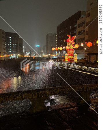 Nagasaki Lantern Festival - Phoenix sculpture and river on a rainy night Nagasaki Lantern Festival - Phoenix sculpture and river on a rainy night 139249282