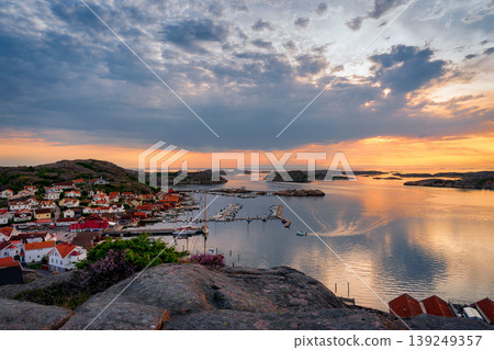 Sunset in the beautiful fishing village of Bobalstrand on Sweden's west coast. Sunset in the beautiful fishing village of Bobalstrand on Sweden's west coast. 139249357