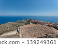 The cityscape of Taormina and the sea as seen from Castelmola, Italy. 139249361