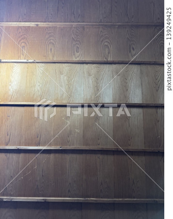 A wall of wood grain marking silence 139249425