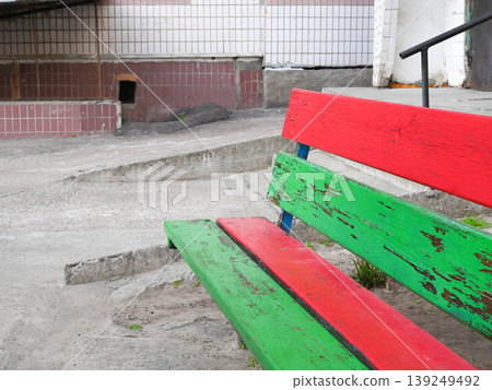 bright wooden bench painted in red and green colors bright wooden bench painted in red and green colors 139249492