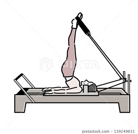 Bob, a woman, is doing back training on a Pilates machine. 139249631