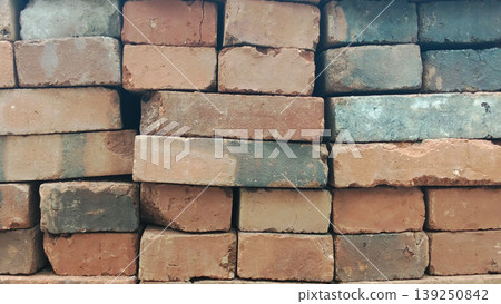 Neat Arrangement of Traditional Red Clay Bricks for Building Construction Materials Neat Arrangement of Traditional Red Clay Bricks for Building Construction Materials 139250842