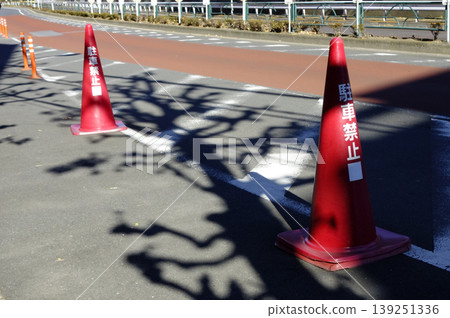 Traffic cones and red triangular cones used for road closures Traffic cones and red triangular cones used for road closures 139251336