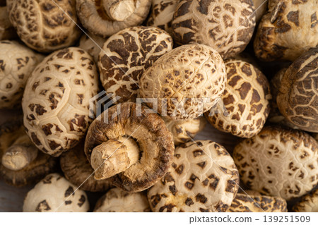 Dried shiitake mushroom on wooden background. healthy food. Dried shiitake mushroom on wooden background. healthy food. 139251509
