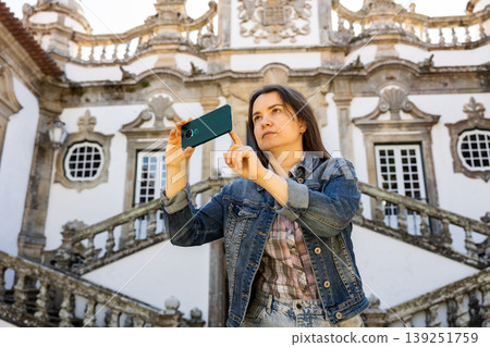 Woman tourist with phone, Vila Real, Portugal 139251759
