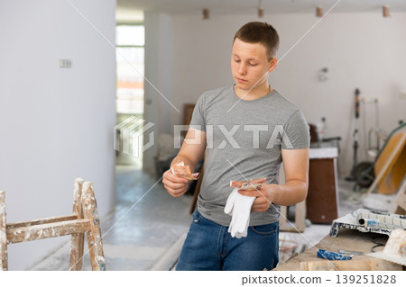 Fifteen-year-old teenager counting the first salary Fifteen-year-old teenager counting the first salary 139251828