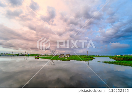 Abandoned House in Donggang Wetland at Sunset Abandoned House in Donggang Wetland at Sunset 139252335