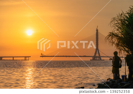 Sunset view of Danjiang Bridge construction in Tamsui, Taiwan Sunset view of Danjiang Bridge construction in Tamsui, Taiwan 139252358