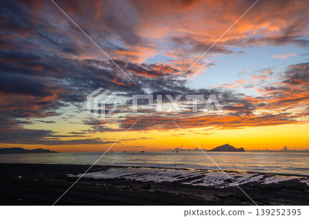 Sunrise over Guishan Island in Zhuangwei, Yilan, Taiwan Sunrise over Guishan Island in Zhuangwei, Yilan, Taiwan 139252395