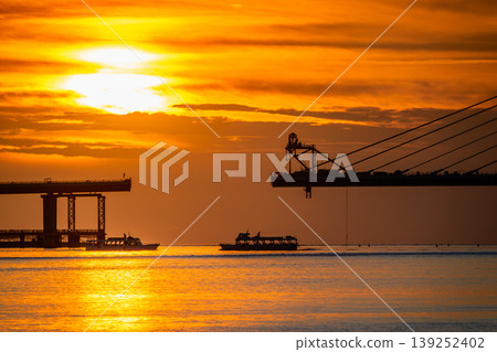 Sunset at Danjiang Bridge Construction Site in New Taipei City Sunset at Danjiang Bridge Construction Site in New Taipei City 139252402