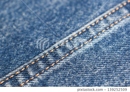 seam of blue denim texture background, jean fashion style seam of blue denim texture background, jean fashion style 139252509