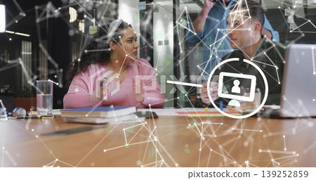 Collaborating three professionals discussing strategy in meeting room, with laptop and sticky notes Collaborating three professionals discussing strategy in meeting room, with laptop and sticky notes 139252859
