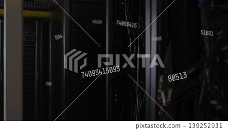 Displaying central server rack with servers and cables in data center aisle, with numeric overlays Displaying central server rack with servers and cables in data center aisle, with numeric overlays 139252931