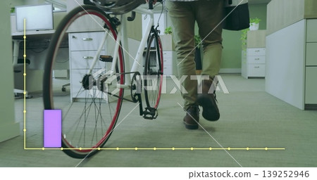 Walking Asian man pushing fixed-gear bicycle in modern office with cabinets and plants, copy space 139252946
