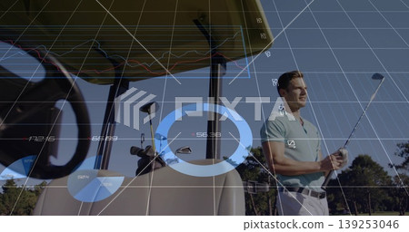 Gripping golf club, viewing line graphs, pie charts beside golf cart bag on fairway, copy space Gripping golf club, viewing line graphs, pie charts beside golf cart bag on fairway, copy space 139253046