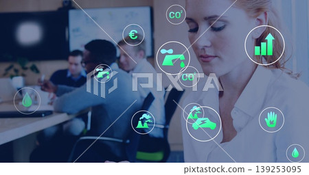 Woman wearing white shirt analyzing tablet data in boardroom, with green data icons, copy space Woman wearing white shirt analyzing tablet data in boardroom, with green data icons, copy space 139253095