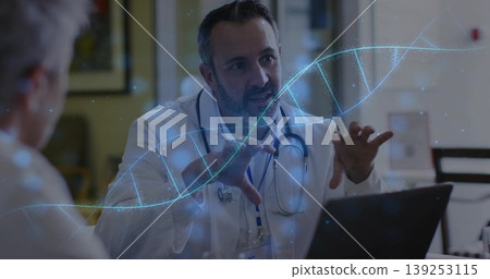 Gesturing male doctor explaining genetic test in office exam room, with holographic DNA helix Gesturing male doctor explaining genetic test in office exam room, with holographic DNA helix 139253115