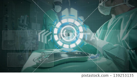 Surgeon in gown adjusting holographic interface in operating room with instrument tray, copy space Surgeon in gown adjusting holographic interface in operating room with instrument tray, copy space 139253135