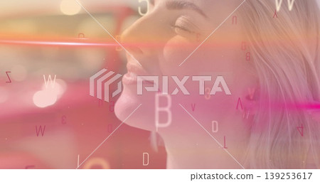 Showing close-up woman tilting head in studio, with floating letters and numbers, copy space Showing close-up woman tilting head in studio, with floating letters and numbers, copy space 139253617