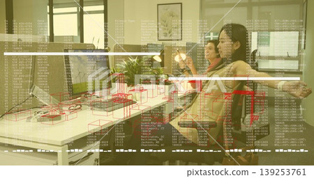 Stretching business colleagues raising arms behind shared desk in modern office, with dual monitors Stretching business colleagues raising arms behind shared desk in modern office, with dual monitors 139253761