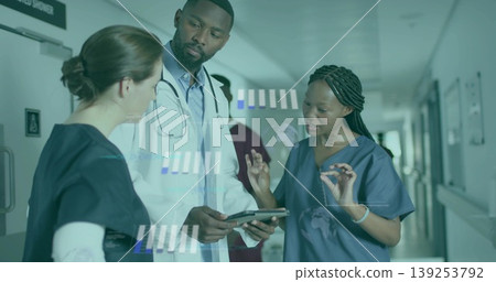 Doctor in lab coat reviewing patient data in hospital hall, with tablet, stethoscope and holograms Doctor in lab coat reviewing patient data in hospital hall, with tablet, stethoscope and holograms 139253792