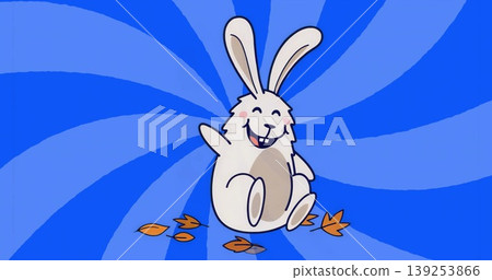 Waving floppy-eared cartoon rabbit smiling against blue spiral backdrop, with orange leaves Waving floppy-eared cartoon rabbit smiling against blue spiral backdrop, with orange leaves 139253866