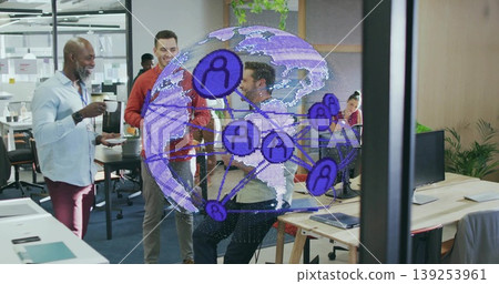 Collaborating colleagues interacting with augmented reality globe in office lounge, with laptops Collaborating colleagues interacting with augmented reality globe in office lounge, with laptops 139253961