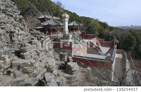 Monastery building among the stones of ancient Buddhist Foxiange Temple in Yiheyuan Park in Beijing Monastery building among the stones of ancient Buddhist Foxiange Temple in Yiheyuan Park in Beijing 139254037