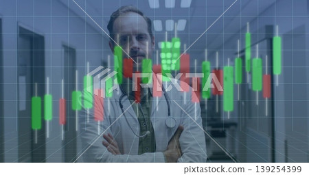 Doctor in lab coat with stethoscope surveying hospital corridor, with candlestick and grid overlays Doctor in lab coat with stethoscope surveying hospital corridor, with candlestick and grid overlays 139254399