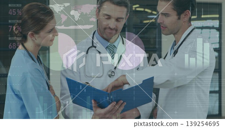 Collaborating medical staff reviewing patient records in hospital corridor, with digital overlays Collaborating medical staff reviewing patient records in hospital corridor, with digital overlays 139254695