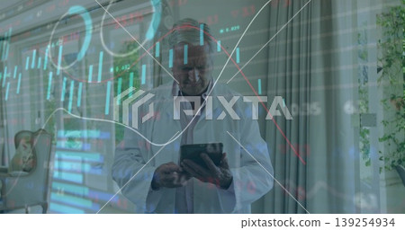Studying overlaid charts doctor in white lab coat using tablet in medical office, with potted plant Studying overlaid charts doctor in white lab coat using tablet in medical office, with potted plant 139254934