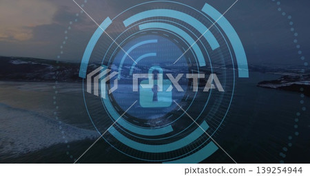 Displaying security overlay on coastal dusk view, featuring padlock icon, binary code, rings 139254944