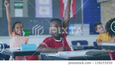 Raising hands four students sitting at classroom desks, with notebooks pencils textbooks 139255050