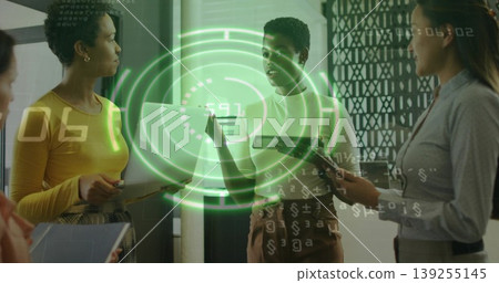 Collaborating four women sharing data in office meeting with devices docs stylus and green hologram Collaborating four women sharing data in office meeting with devices docs stylus and green hologram 139255145