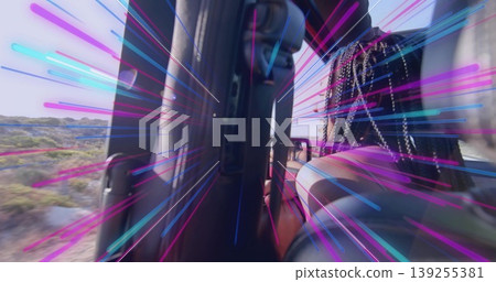 Riding woman wearing black top gripping headrest on dirt track with motion-lines, copy space 139255381
