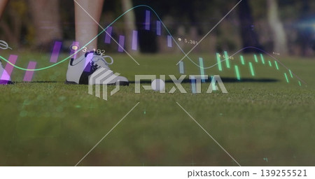 Standing golfer's legs in white shoes next to ball on putting green showing candlestick overlay Standing golfer's legs in white shoes next to ball on putting green showing candlestick overlay 139255521
