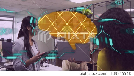Collaborating three professionals studying AR brain graphic in open-plan office with laptop tablet Collaborating three professionals studying AR brain graphic in open-plan office with laptop tablet 139255548