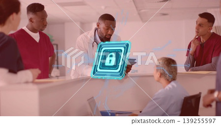Holding tablet doctor in white coat reviewing data at hospital nursing station, with padlock icon Holding tablet doctor in white coat reviewing data at hospital nursing station, with padlock icon 139255597